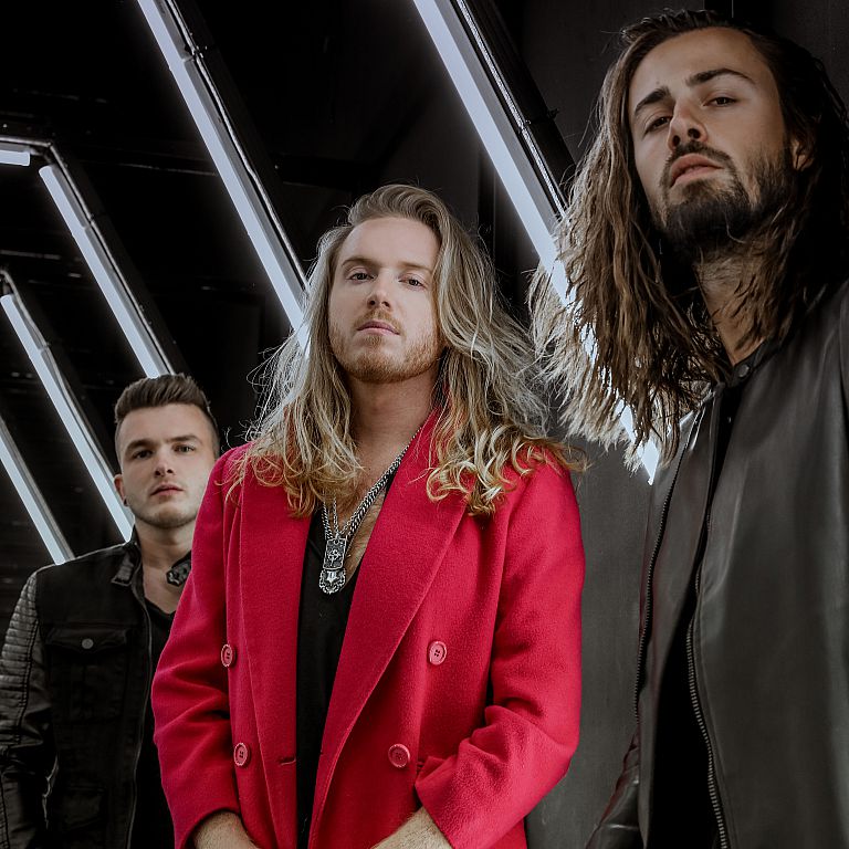 Levara    LEVARA brings life to the individual talents of three musicians whose paths feel less accidental and more inevitable. Formed in Los Angeles, the band unites vocalist Jules Galli, guitarist/producer Trev Lukather, and drummer Josh Devine—three 